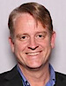 International Voyager President & CEO: John Maguire